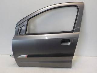 Portier links voor Suzuki Alto (GF) (2009 - heden) Hatchback 5-drs 1.0 12V (K10B)